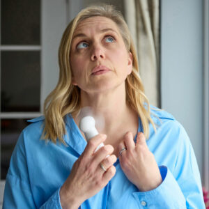 woman experiencing menopause hot flash